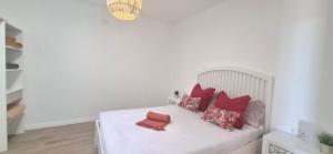 a white couch with pillows on it in a room at Fuerte Roche 2 in Tuineje