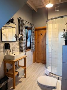 a bathroom with a sink and a shower at Wypoczynek pod Lipami in Ruciane-Nida +104 photos
