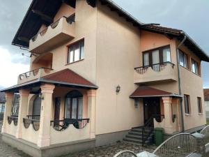 a building with balconies on the side of it at Villa Lana in Bihać