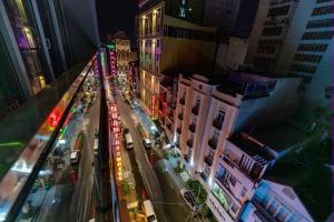 an overhead view of a city street at night at Hola Hotel in Can Tho