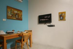 TV tai viihdekeskus majoituspaikassa Arabian Suites