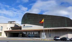 a building with a flag in front of it at Panorama Nacional in Ávila