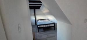 a view of a bedroom with a bed in a room at casa stadio2 in Leverkusen