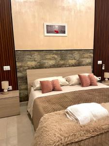 a bedroom with two beds in a room at Dimora Borbonica 1 in Marcianise +17 photos