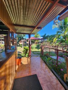 a view from the kitchen of a house with a patio at Hostal Bullshark in Cuatro Esquinas