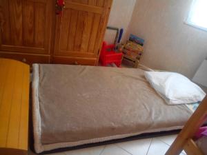 Postel nebo postele na pokoji v ubytování Charmante Dépendance
