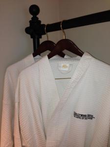 a white shirt is hanging on a rack at Hollywood Hotel in Los Angeles