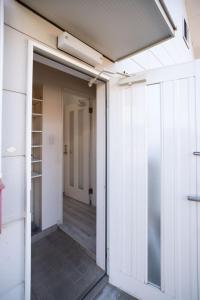 an open door to a hallway in a building at 不二咲 in Fujiyoshida +33 photos
