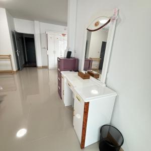 a dressing room with a mirror and a vanity at Kitjamyhome2 in Ban Tha Thon +35 photos