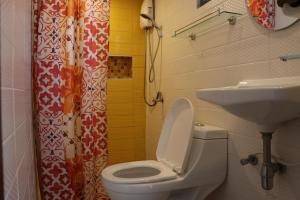 Ванна кімната в Noom Guesthouse