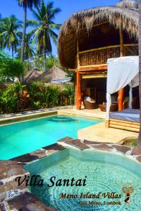 a resort with a swimming pool and a hut at Meno Island Villas in Gili Meno