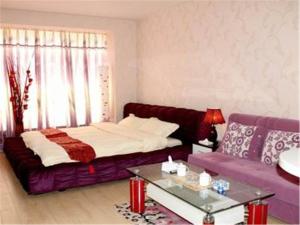 Una habitación en Beijing Futon Family Apartment