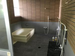 Koupelna v ubytování Hotel Famitic Myojin