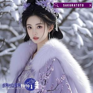 a woman wearing a purple dress with white fur at Sakuratoto in Mengwi