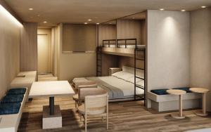a bedroom with a bunk bed and a table and chairs at Hotel Setre Kobe Maiko in Kobe +85 photos