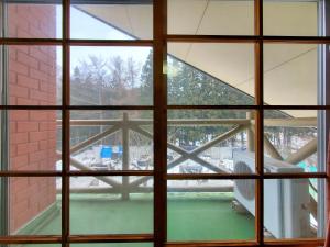 a view through a window of a building at 横磐梯リロード in Inawashiro