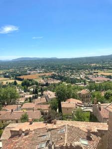 a view of a town from the roof of a building at Chez Jo Fayence in Fayence