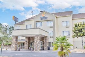 a hotel with a sign on the front of it at Comfort Inn & Suites Montgomery East Carmichael Rd in Montgomery