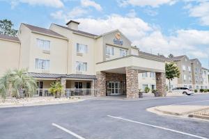 a rendering of the front of a hotel with a parking lot at Comfort Inn & Suites Montgomery East Carmichael Rd in Montgomery