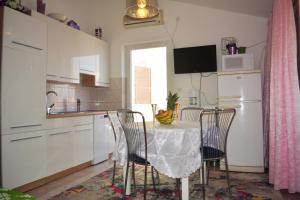 Kuchyň nebo kuchyňský kout v ubytování Apartment Vesna