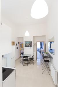 Televízia a/alebo spoločenská miestnosť v ubytovaní BpR Oktogon Center Apartment