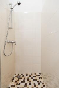 Kúpeľňa v ubytovaní BpR Oktogon Center Apartment + 16 fotografií