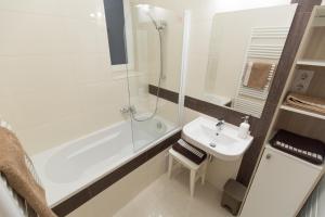 Kúpeľňa v ubytovaní BpR Oktogon Center Apartment