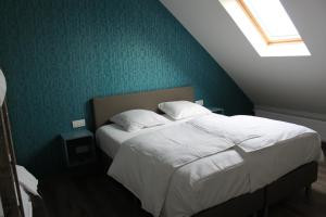 Postel nebo postele na pokoji v ubytování De Maalderie Holiday Home