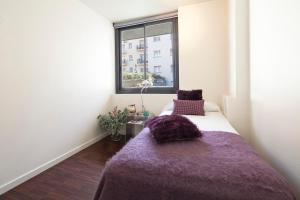 Posteľ alebo postele v izbe v ubytovaní Apartment Barcelona Rentals - Private Pool and Garden Center