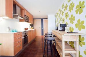 Kuchyňa alebo kuchynka v ubytovaní Apartment Barcelona Rentals - Private Pool and Garden Center