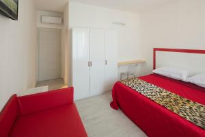 Postel nebo postele na pokoji v ubytování Affittacamere Margherita