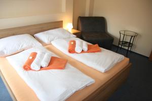 Posteľ alebo postele v izbe v ubytovaní Hotel Praha Potštejn