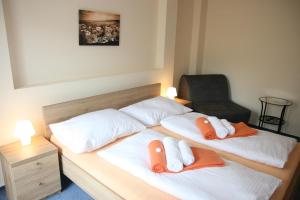 Posteľ alebo postele v izbe v ubytovaní Hotel Praha Potštejn