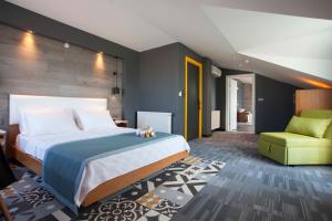 Postel nebo postele na pokoji v ubytování Hotel Cura