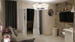 Televízia a/alebo spoločenská miestnosť v ubytovaní Apartment Orlando Costa Adeje