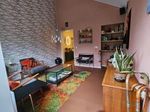 a living room with a couch and a table at appartement Kemperberg in Arnhem