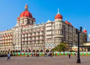 a large building with red domes on top of it at Sunlight Dormitory in Mumbai