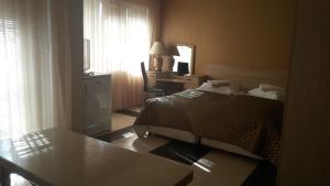 Postel nebo postele na pokoji v ubytování Family Hotel Kartala