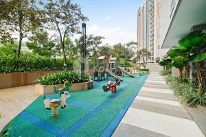 a playground at a resort with a slide at Velir by Kozystay - BSD in Cilenggang