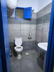 a bathroom with a toilet and a sink at Balsam hotel in Dahab