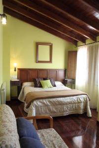 Ένα ή περισσότερα κρεβάτια σε δωμάτιο στο Hotel Casa Vieja del Sastre