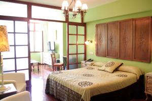 Ένα ή περισσότερα κρεβάτια σε δωμάτιο στο Hotel Casa Vieja del Sastre