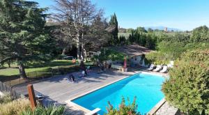 an overhead view of a swimming pool in a yard at Mas Des Fleurs - Olive House in Perpignan