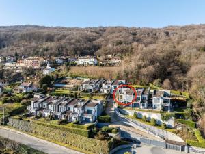 an aerial view of a suburb with houses at Refugio Azul Baveno, pool and private parking in Baveno