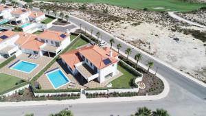 an aerial view of a house at Villa del Rey III in Casal da Lagoa Seca