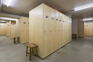a row of wooden lockers in a room at SOWELL FAMILY Vars in Vars