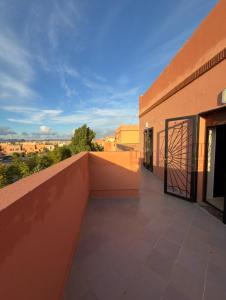 a balcony with a view of a building at Charming Bohemian hideaway in Marrakech in Marrakesh