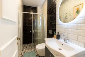 a bathroom with a sink and a shower at Maison Istanbulite in Istanbul +51 photos