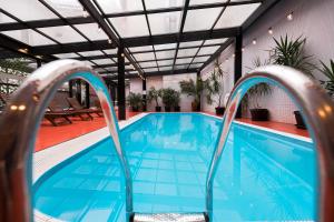 Der Swimmingpool an oder in der Nähe von Hotel Concordia