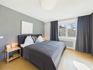 En eller flere senge i et værelse på Boutique73 Suite Garden